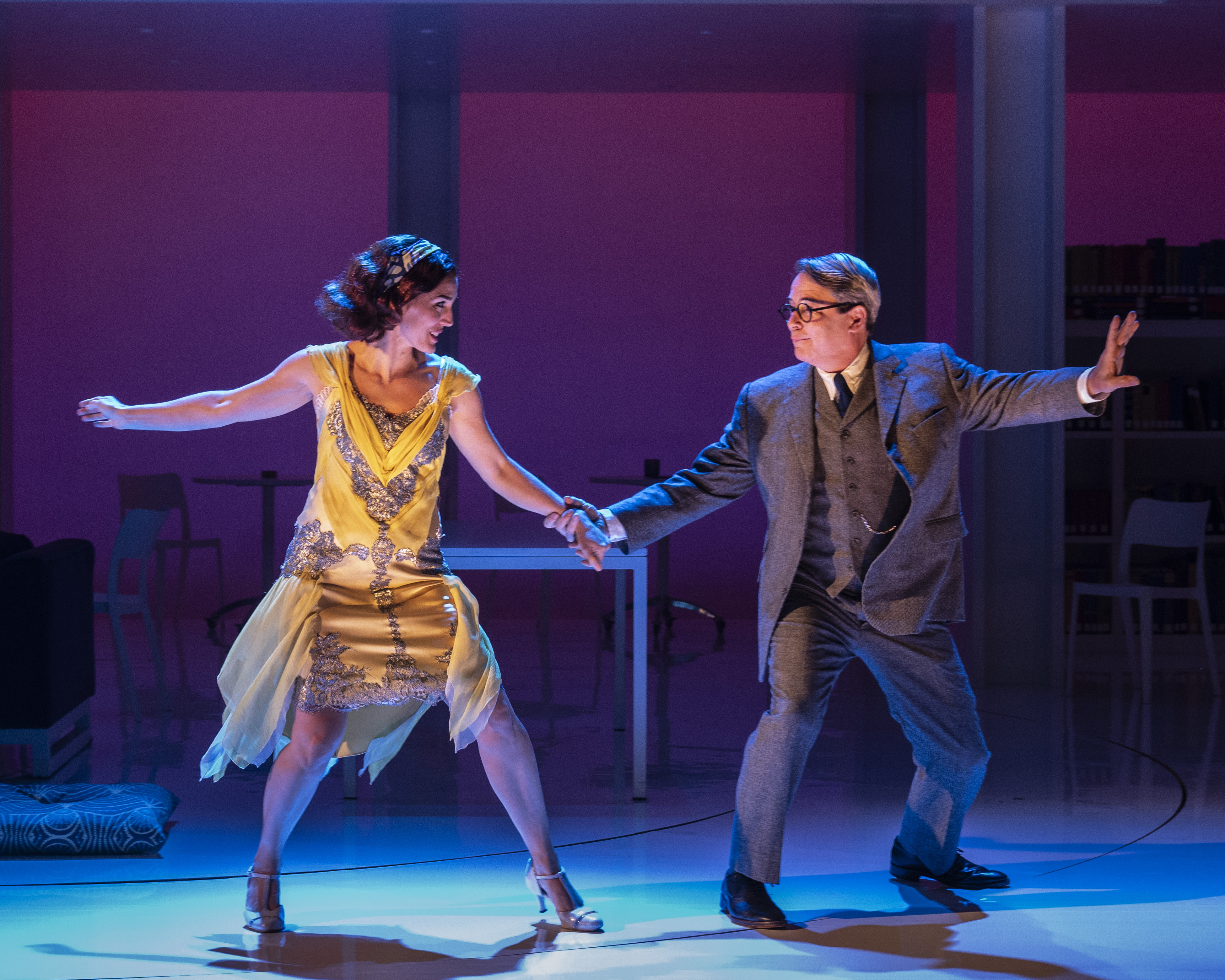 Mara Davi and Matthew Broderick partner dancing under intimate lighting. 